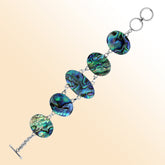 Handmade abalone shell and sterling silver bracelet with oval panels, ocean-inspired jewelry from Bali